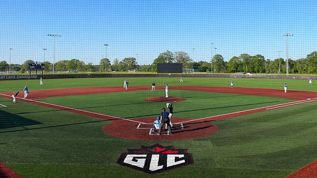 A view from behind home plate of a baseball field constructed by 39 Seven.