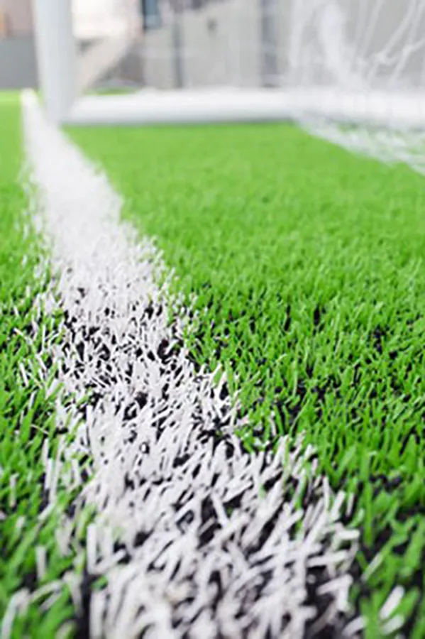 A close up of artificial turf infill.