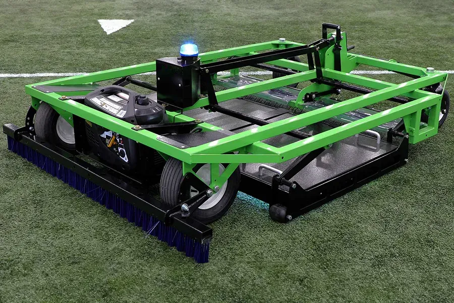 A turf sanitization implement that can be towed behind a small tractor.