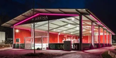 A covered, relocatable arena for hockey, soccer, tennis and other sports.