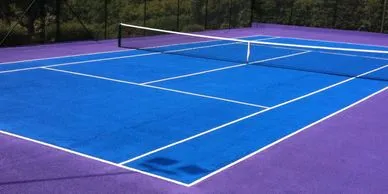 A tennis court made from artificial turf.