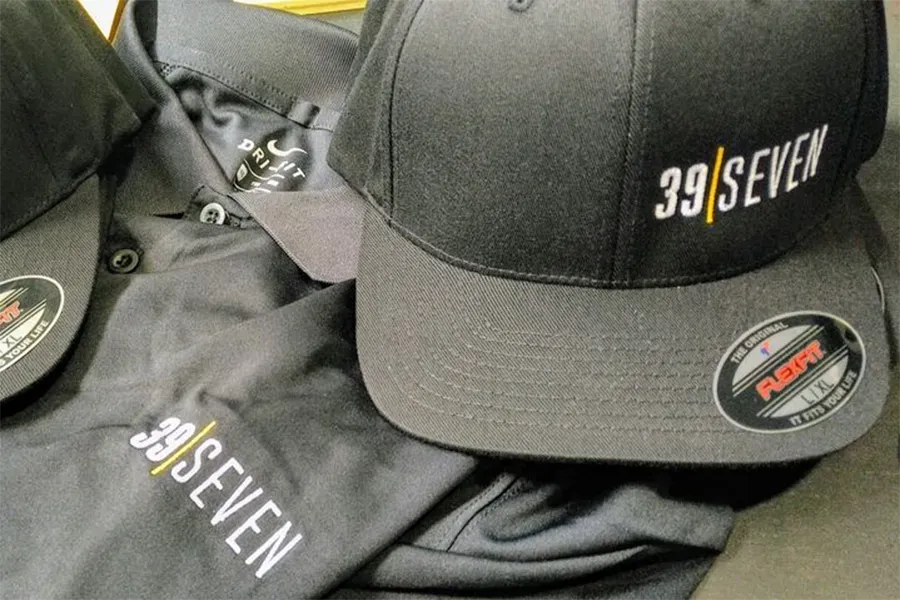 39 Seven hats and golf shirts.